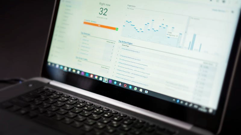 Team reviewing a content automation platform dashboard with website analysis and publishing metrics