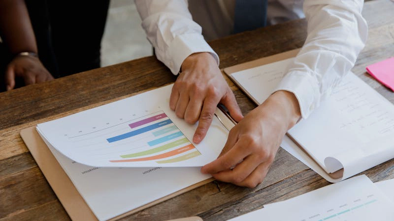 Marketing team reviewing software metrics to choose the right seo automation platform
