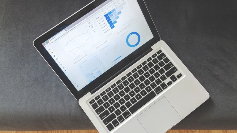 Marketing team testing ChatGPT visibility issues across AI answer engines on a laptop